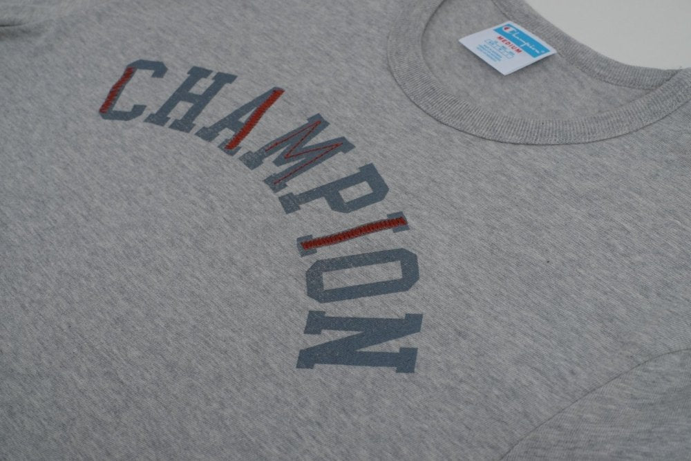 CHAMPION - RW HERITAGE S/S GRAPHIC TEE Men - Rev Online